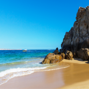 La Paz beach with tall rock outcropping