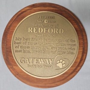 wood-mounted bronze plaque example